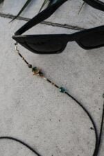 smaragdinė akinių grandinėlė